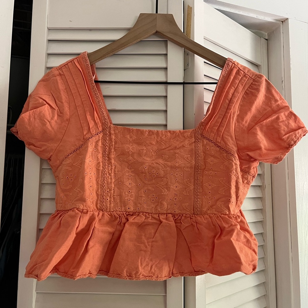 Orange Peplum Blouse with Square Neckline